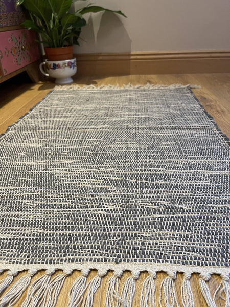 HUSH Hand Loomed Soft Cotton Rug in Muted Colours